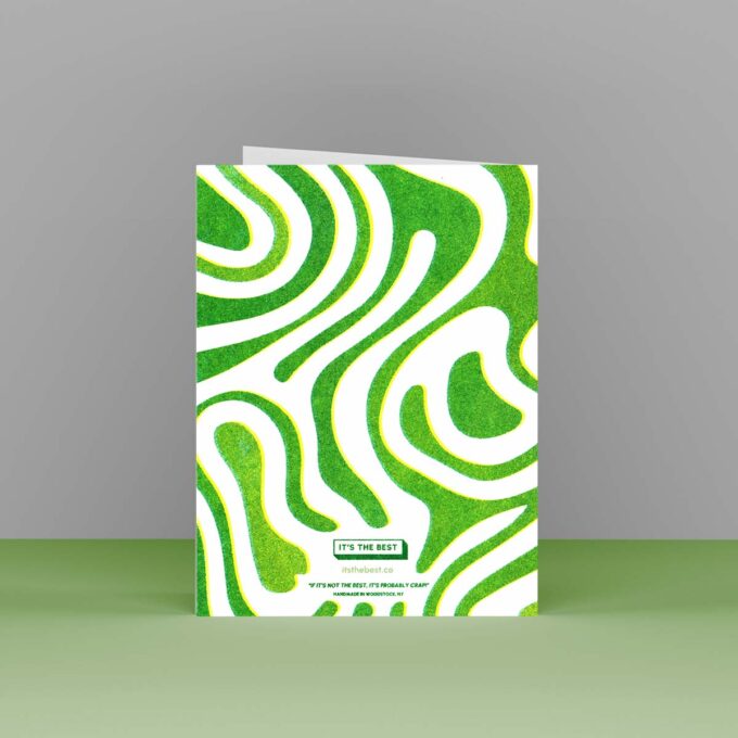 Back of the greeting card showing the green slime pattern and It's the Best logo