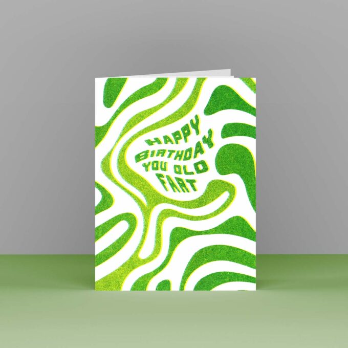 Front of the greeting card showing a slime pattern the text "Happy Birthday You Old Fart"
